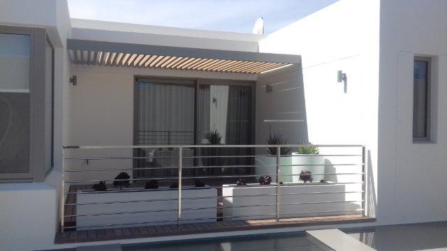 Pergola and stainless steel balustrades.