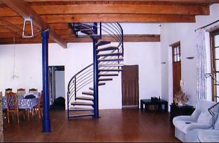 Spiral Staircase with a Stainless Steel Handrail.