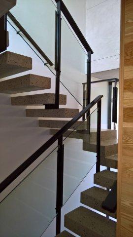 Mild steel balustrades, spray painted black with glass. 